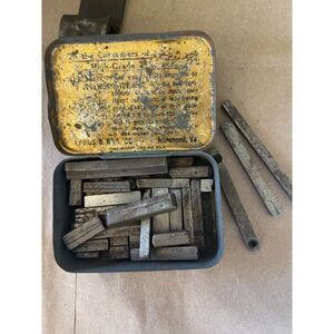 vintage metal box of tool bits